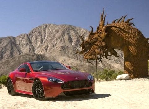 Art Photography of Red Aston Martin on Desert Cliff