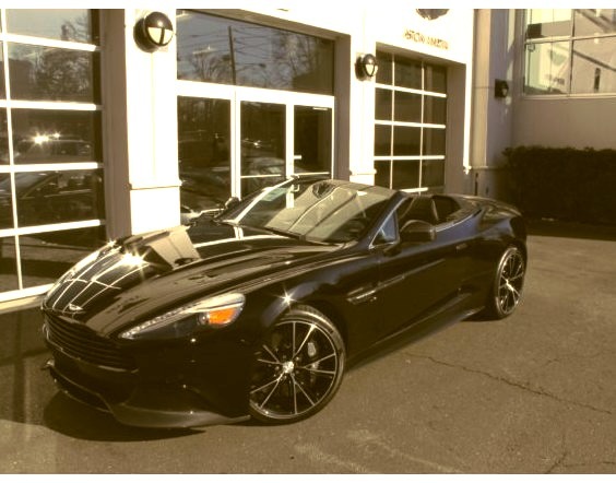 Black Aston Martinwww.DiscoverLavish.com